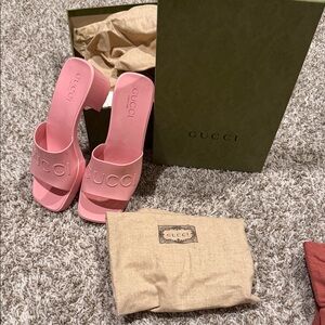 Gucci Pink Embossed Logo Slide Mules
